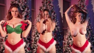 Megan Guthrie se burla de sus tetas desnudas en Navidad Video