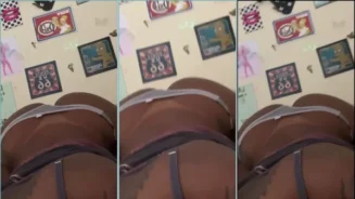 Mujer asiática de piel oscura en posición a cuatro patas con su gran culo encaramado