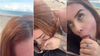 Brendita está realizando sexo oral a su pareja en la playa