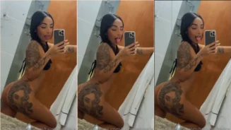 Tainá Ludovica completamente desnuda mostrando el culo con tatuaje en el baño